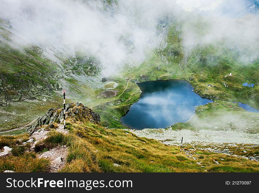 Landscape from Capra Lake in Romania and Fagaras mountains in the summer