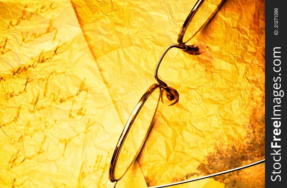 Close up of Vintage paper background with old eyeglasses. Close up of Vintage paper background with old eyeglasses