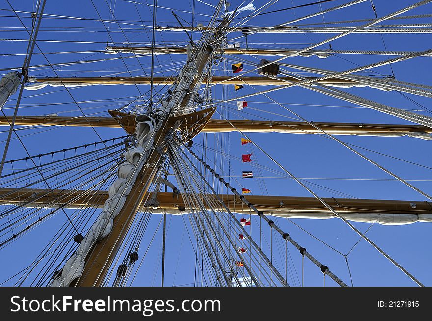 Sails ship masts with flags