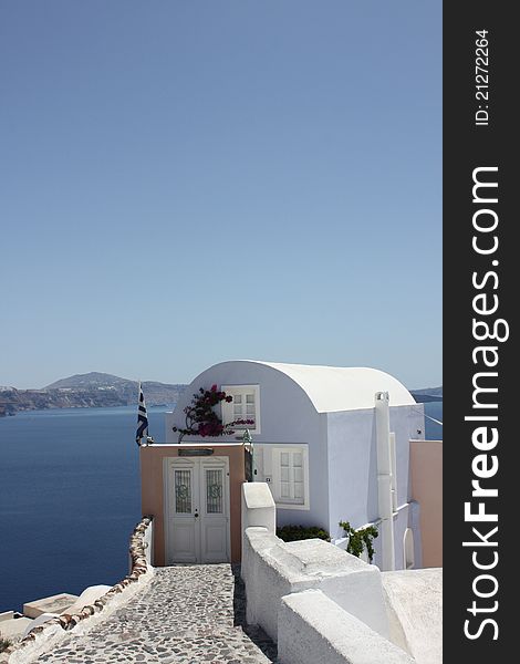 White door in Santorini, landscape panorama and sea in Oia Santorini Greece