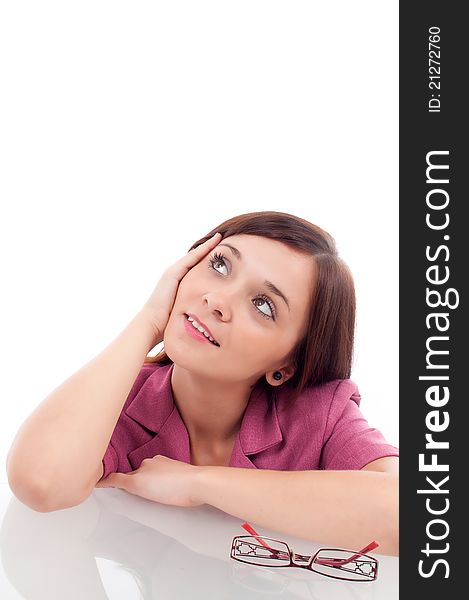 Thoughtful woman looking up isolated over white background