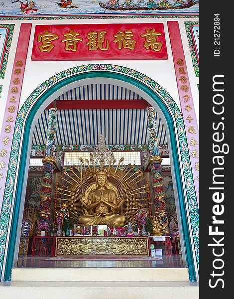 Golden Kuan Yin Statue In Temple