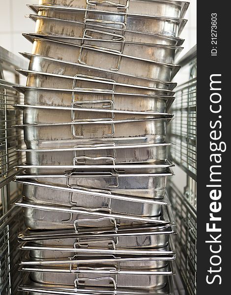 Stack of kitchen utensils at a catering etablishment