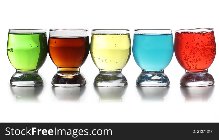 Color photo of a glass cup with tequila. Color photo of a glass cup with tequila