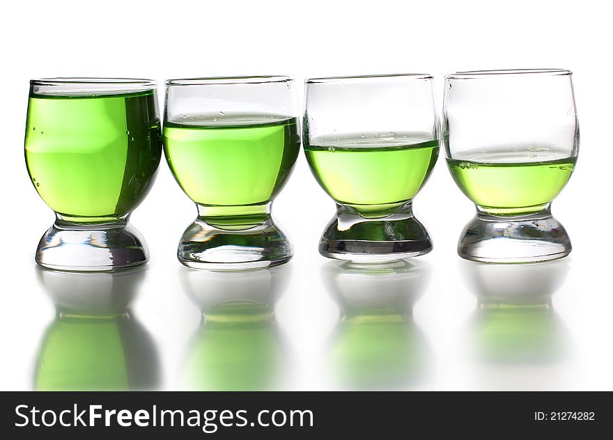 Color photo of a glass cup with tequila. Color photo of a glass cup with tequila