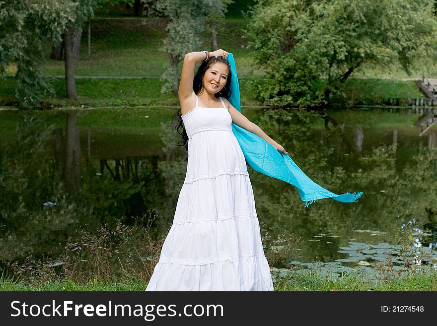 Beautiful Girl Standing Near River