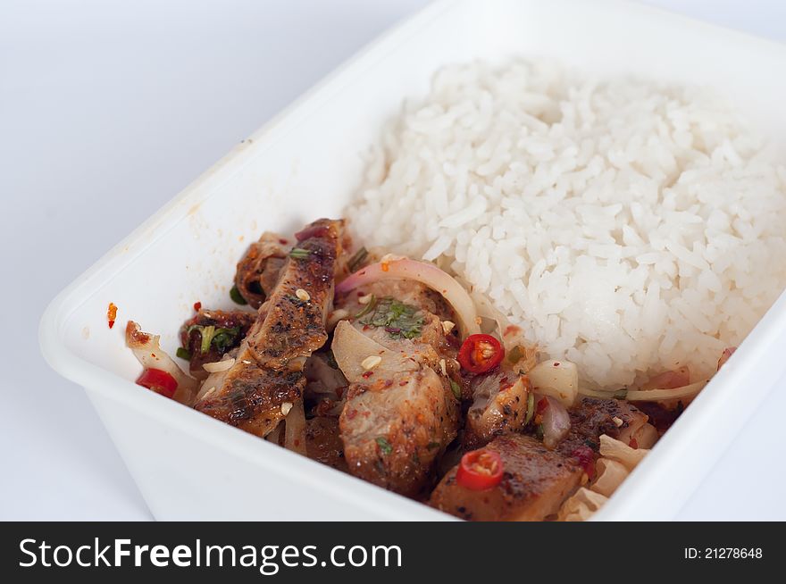 Spicy chicken rice in meal box