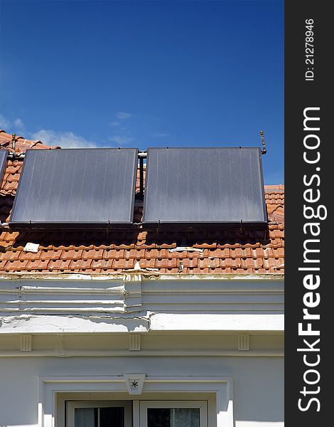 Domestic solar panels catching the sun's rays to power the home