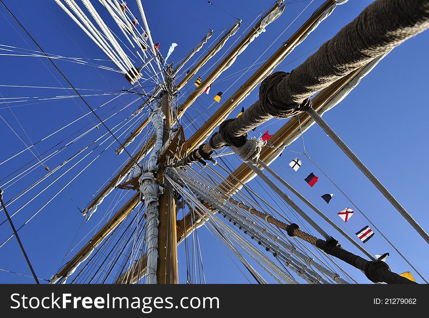 Sails ship masts with flags