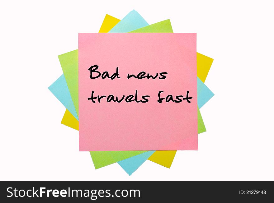 Text Bad news travels fast written by hand font on bunch of colored sticky notes. Text Bad news travels fast written by hand font on bunch of colored sticky notes