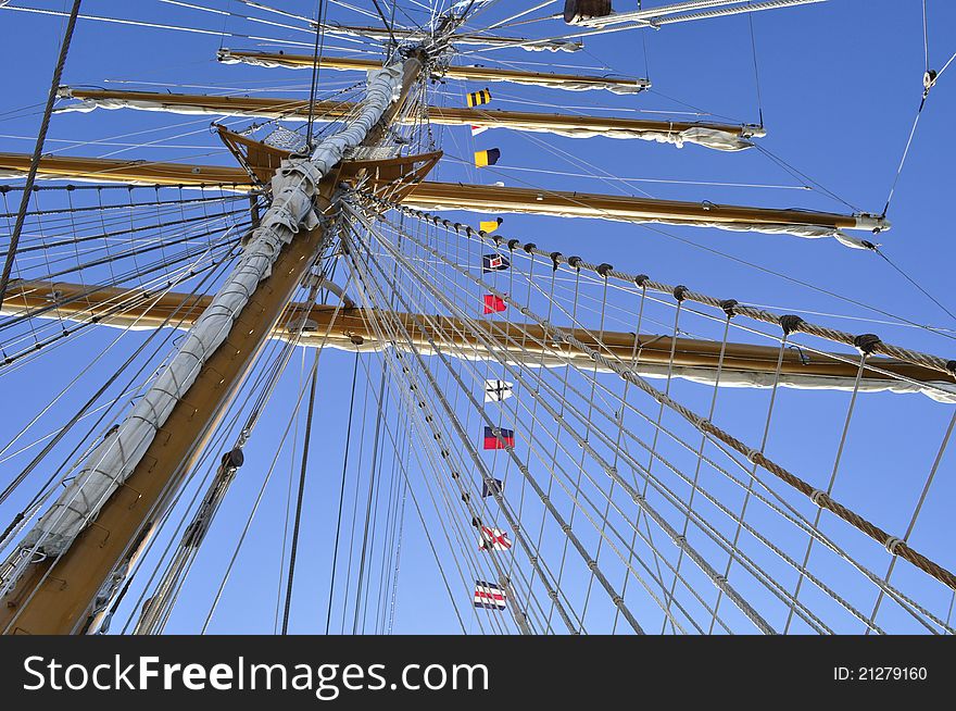 Sails ship masts with flags