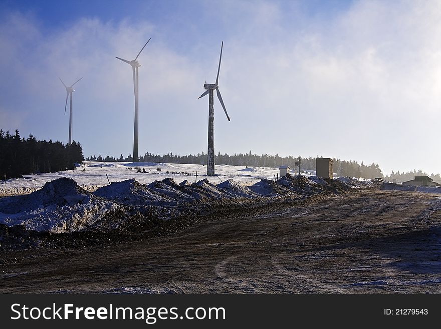 Wind turbines in snowy landscape. Wind turbines in snowy landscape