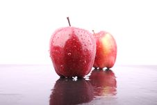 Red Apple On Wet Floor Stock Images