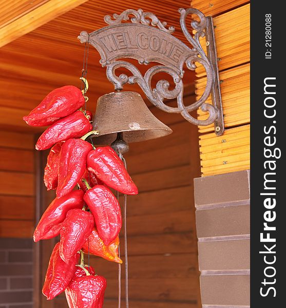 Red peppers gathered and hanging on the bell. Red peppers gathered and hanging on the bell.