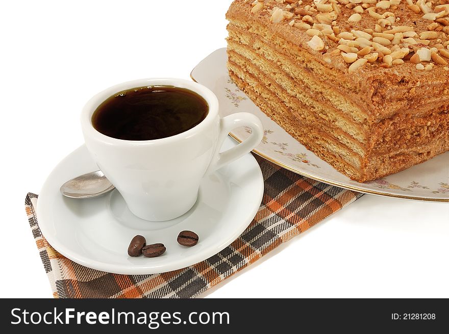 Cup of coffee and cake on a white background