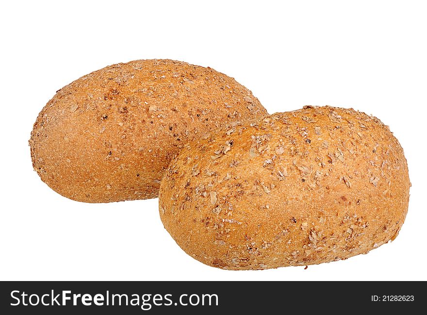 Two buns with bran isolated on white background