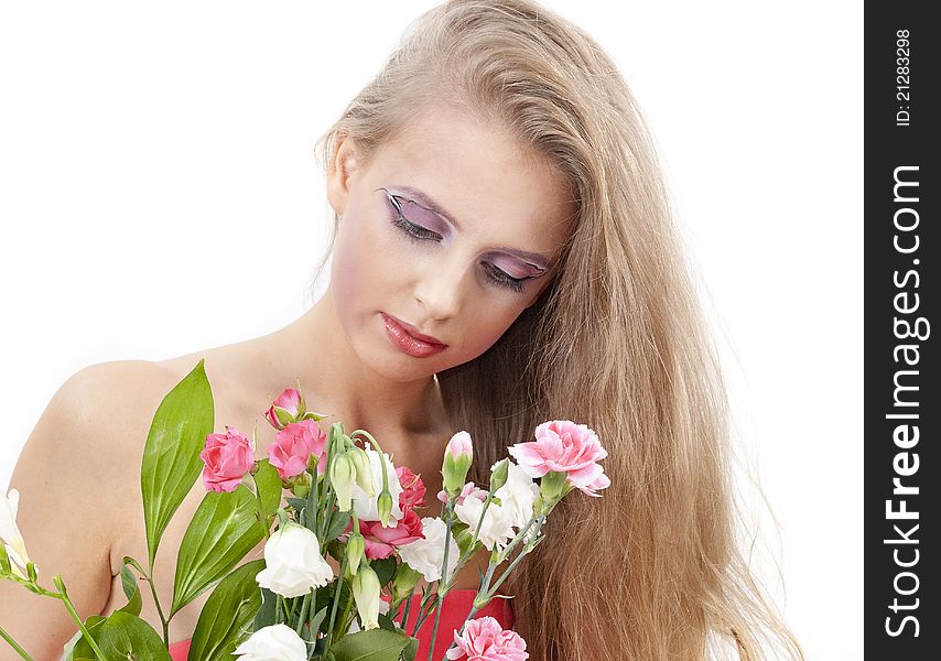 Young beautiful woman with flowers over white