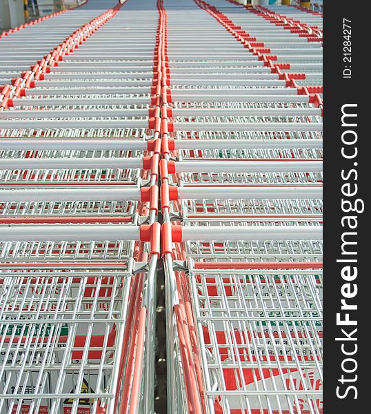 Row of shopping cart in front of supermarket