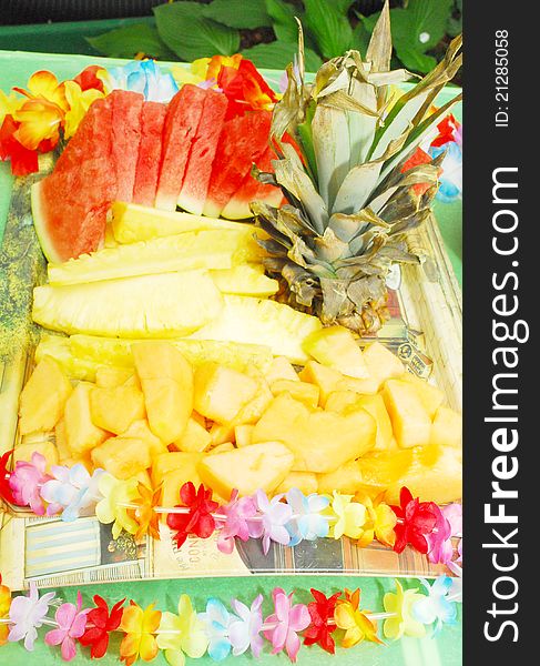 Closeup of Fruit Plate with watermelon, melon, pineapple on Hawaii party.