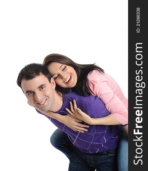 Lovely young couple having fun and smiling. isolated