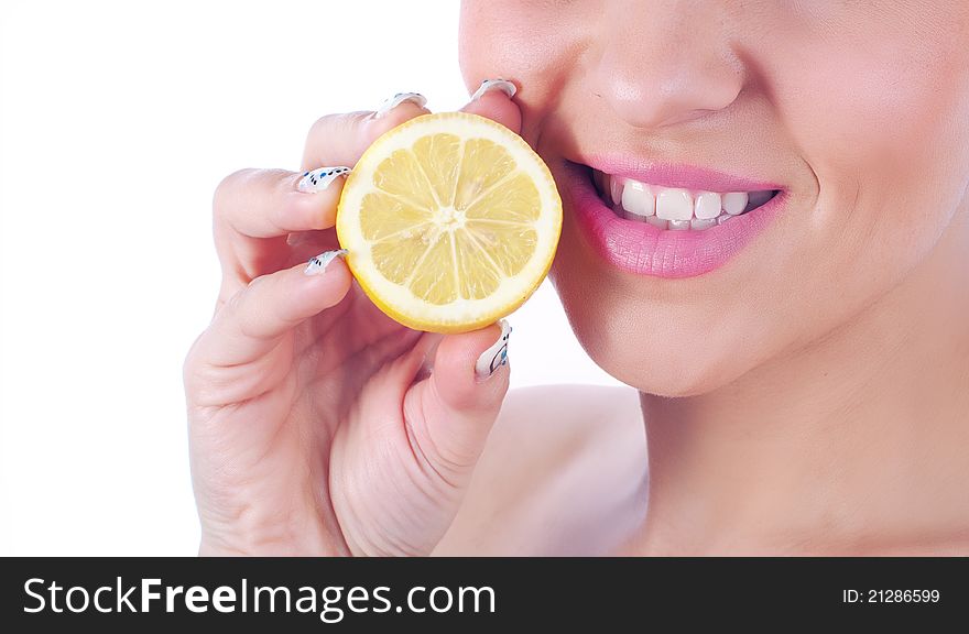Close up photo of a woman with lemon. Close up photo of a woman with lemon