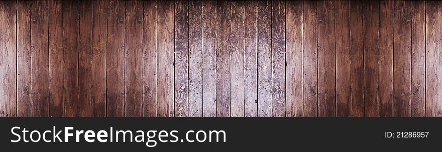 A blank wooden wall with space for text. A blank wooden wall with space for text