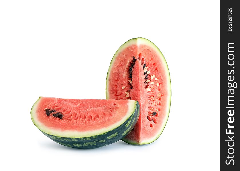 Two pieces of freshness watermelon on white background. Isolated with clipping path. Two pieces of freshness watermelon on white background. Isolated with clipping path