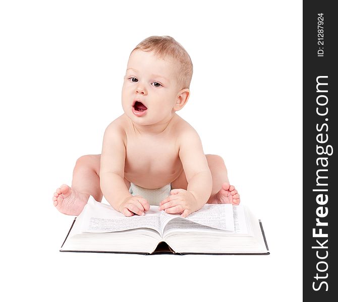 Curious little child play with book while sitting on floor, over white. Curious little child play with book while sitting on floor, over white