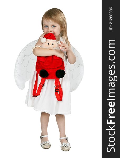 Little girl with angel wings and a red Santa Claus on a white background