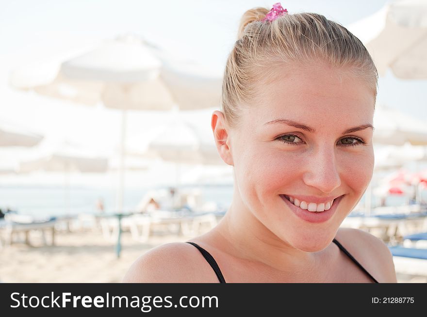 Young woman relaxing on the beach. Young woman relaxing on the beach