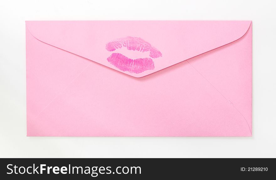 Pink envelope with kiss print on white