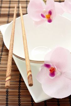 Asian Place Setting With Orchids Royalty Free Stock Photos Asian Place Setting With Orchids Royalty Free Stock Photos