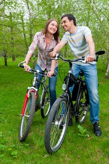 Happy Young Couple Riding Bicycles Royalty Free Stock Photo Happy Young Couple Riding Bicycles Royalty Free Stock Photo