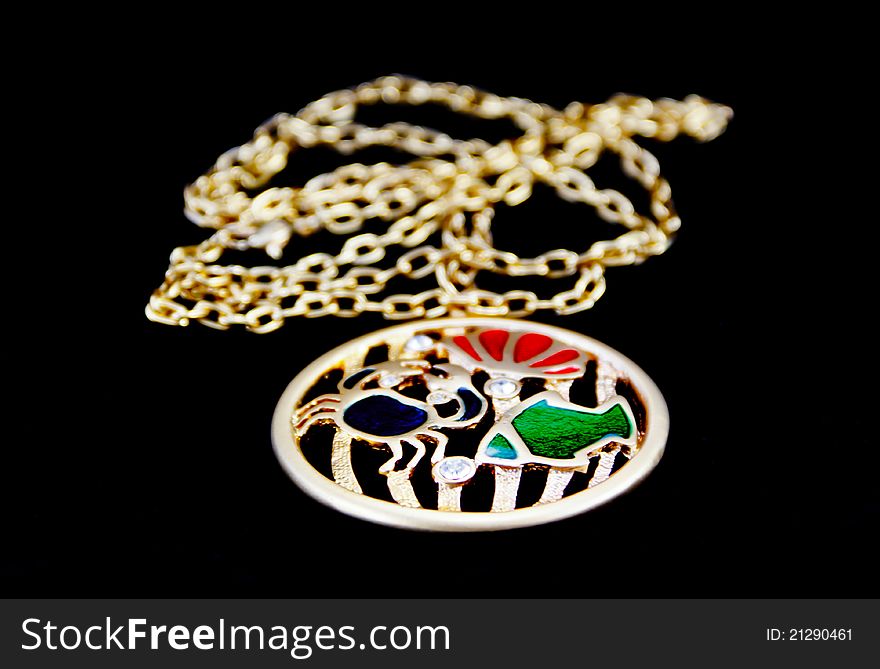 Golden necklace and pendant designed in Aquatic animals style