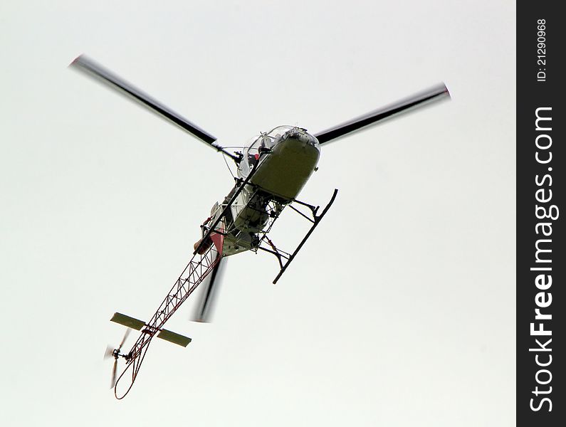 Flight of a helicopter viewed from under