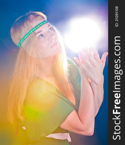 Beautiful fabulous girl in a green dress