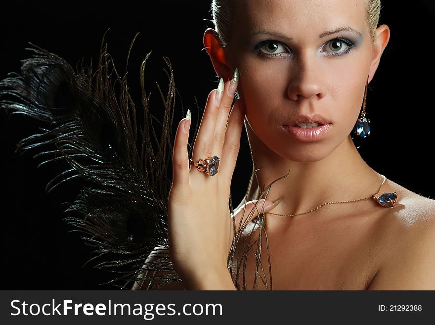 Beautiful girl with blue eyes and decorations