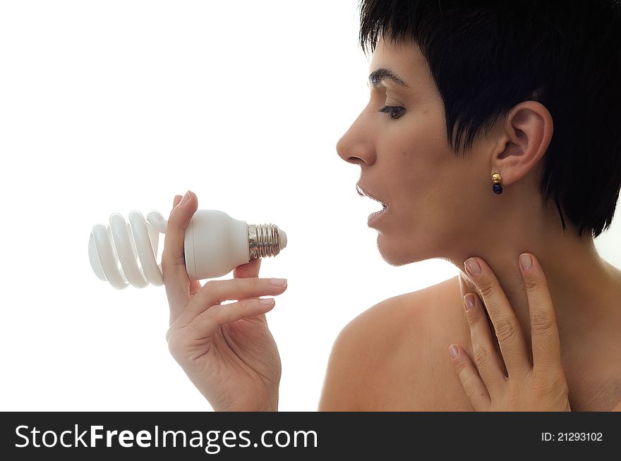 Woman holding bulb over white background. Woman holding bulb over white background