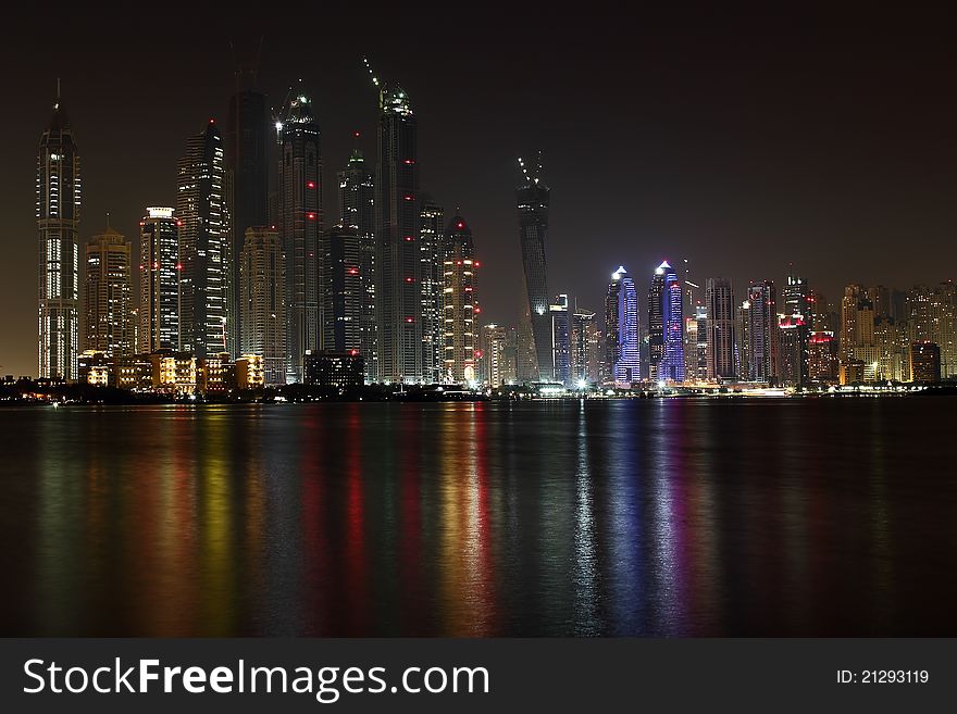 Dubai marina view at night from palm jumeirah. Dubai marina view at night from palm jumeirah