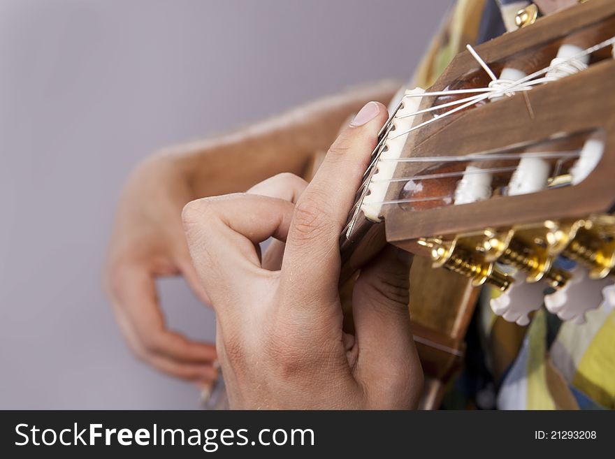 Really great shot capturing detail of a guitarist - shot in studio