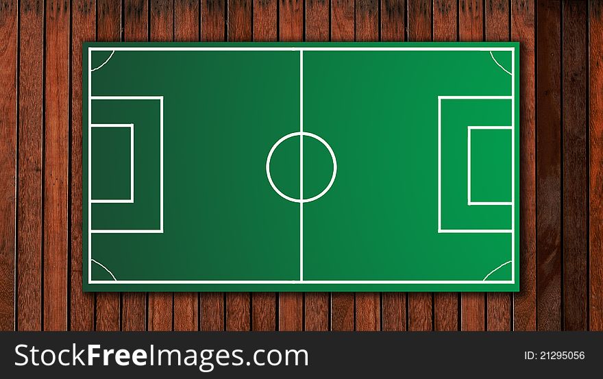 Football tactical board on wooden background, for create new tactic to team.