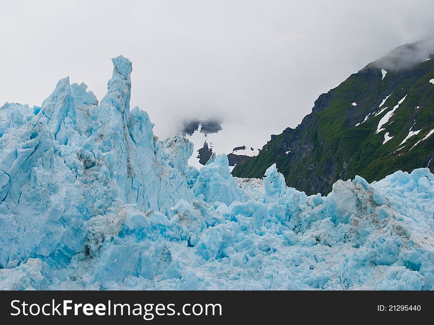 Close view of majestic and interesting glacial textures of Surprise Glacier in Harriman Fjord.