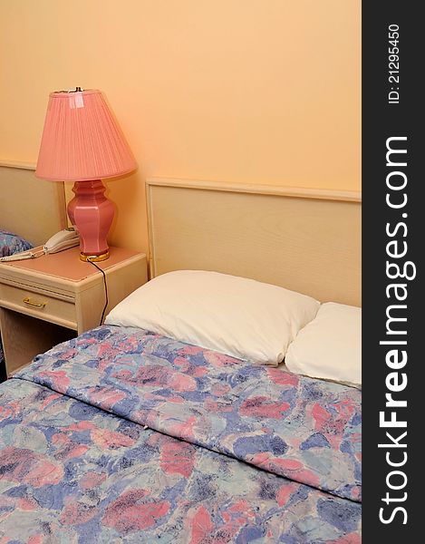 Comfortable bedroom in hotel with table lamp. Comfortable bedroom in hotel with table lamp.