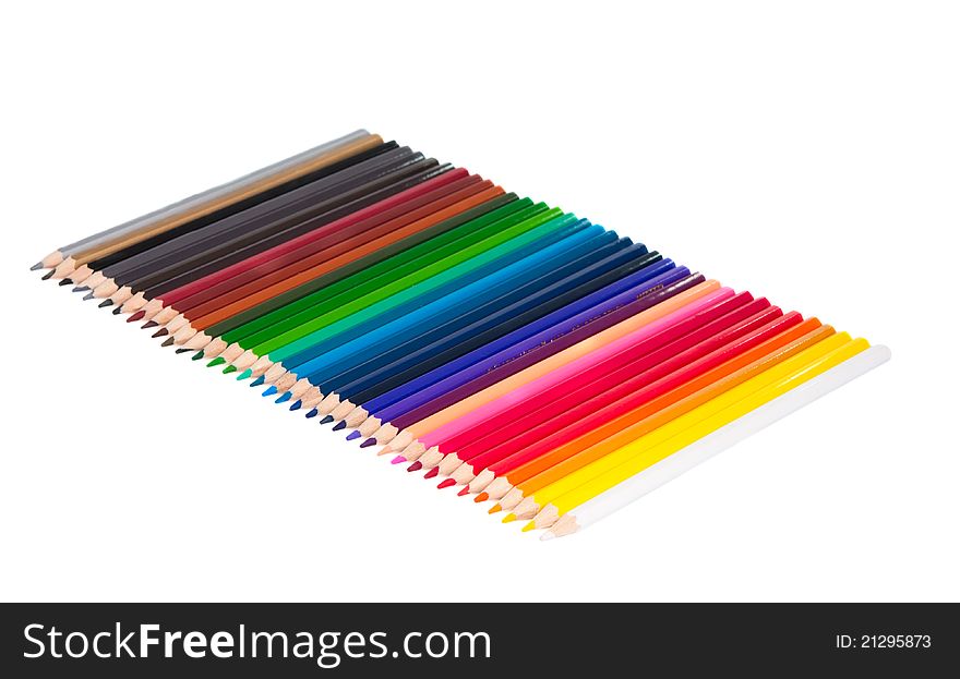 Set of color pencils on white background