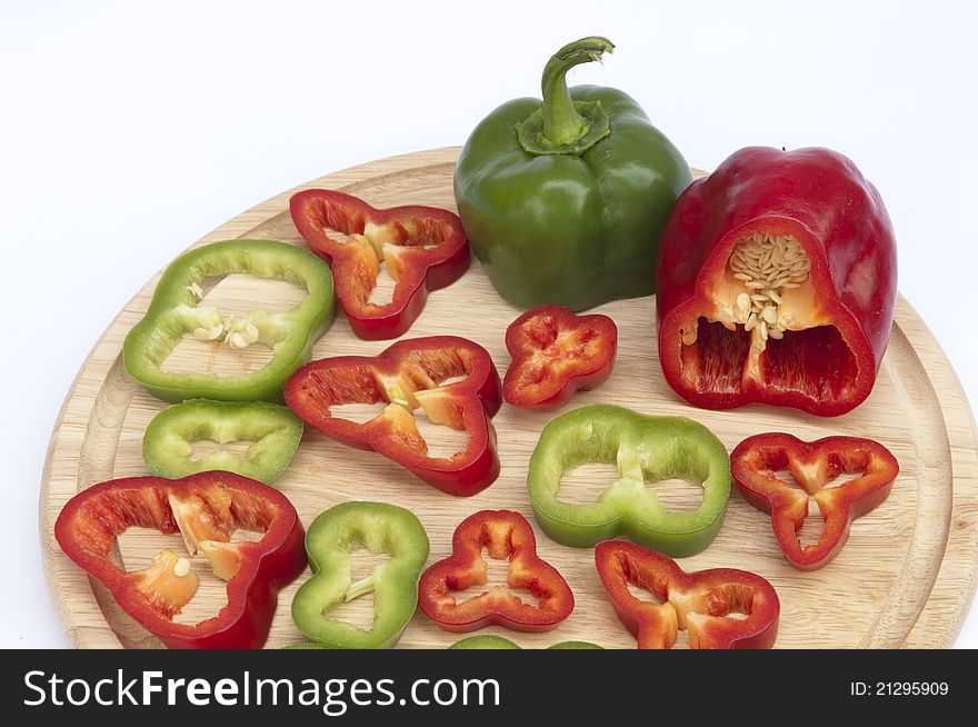 Red and Green Peppers on a white background
