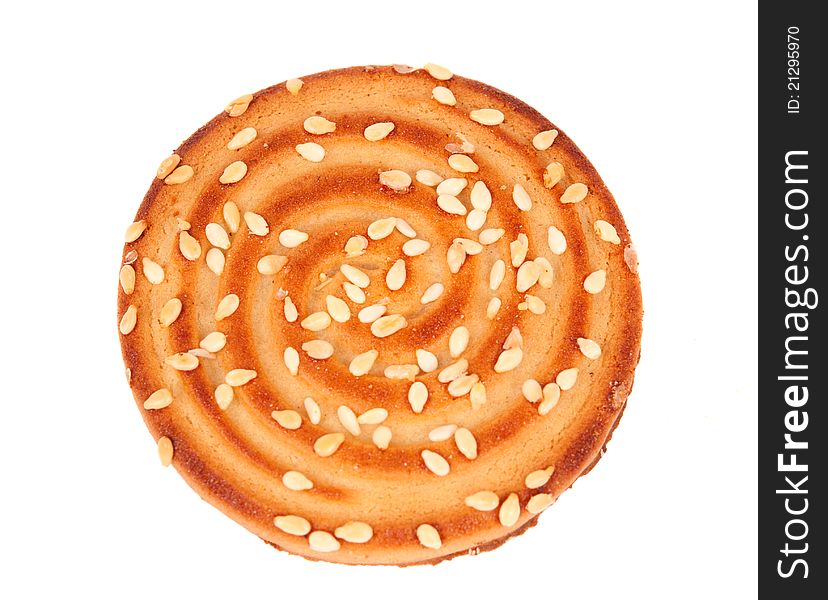 Biscuits with sesame seeds on a white background