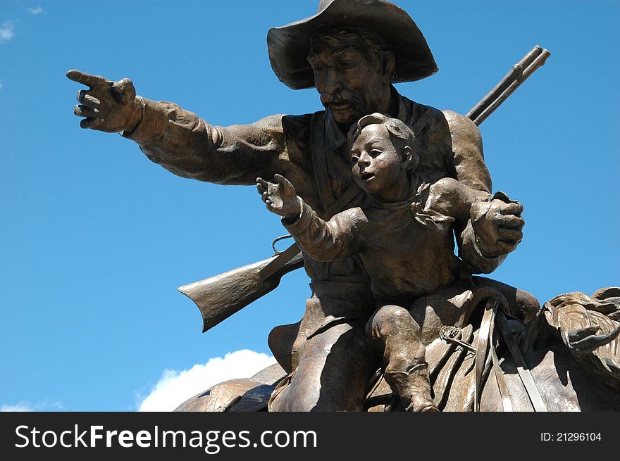 A patriotic statue of man and son. A patriotic statue of man and son