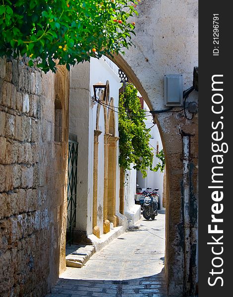 Picturesque Greek street in Lindos, Rhodes