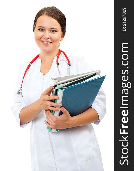 Young medical smiling woman doctor holding files portrait isolated on white background. Young medical smiling woman doctor holding files portrait isolated on white background