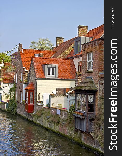 Classic view of channels of Bruges. Belgium. Medieval fairytale city. Summer urban landscape.